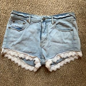 Free people denim lace trimmed shorts